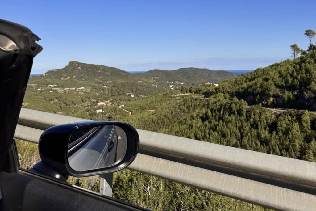 Scenic mountain road view in North Ibiza during a self-drive route