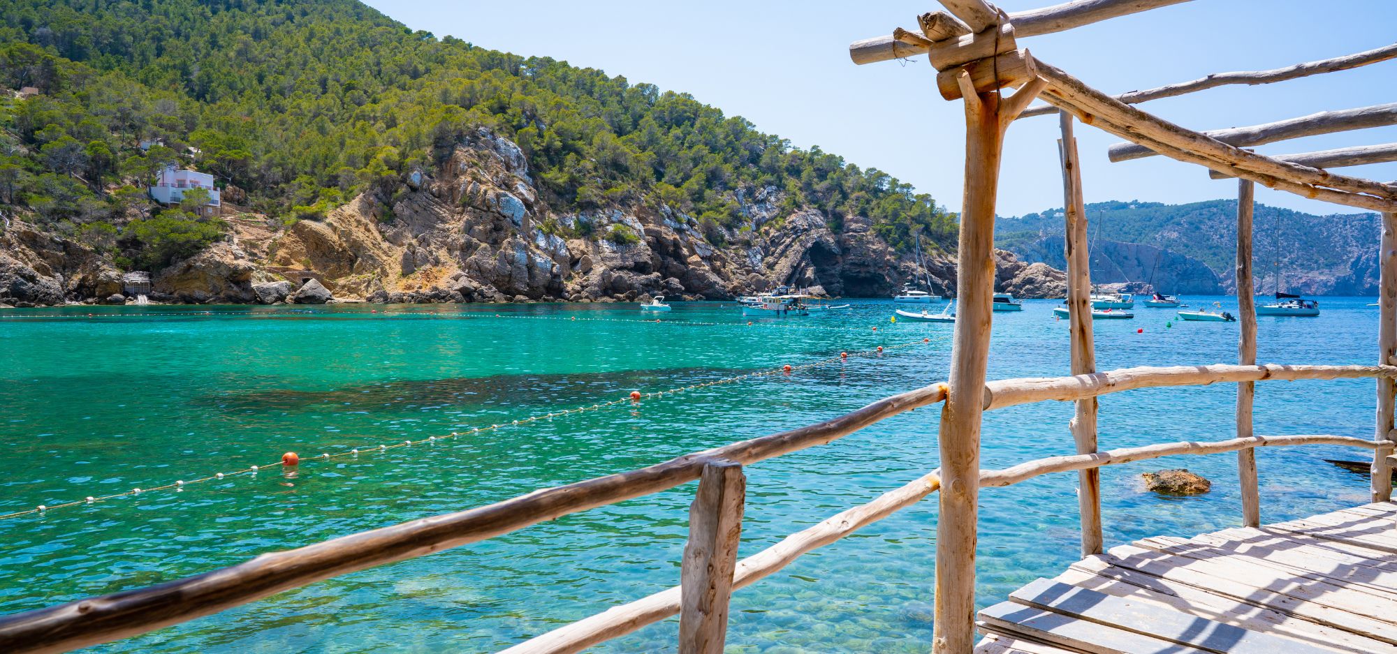 turquoise bay with crystal clear water in the north of ibiza